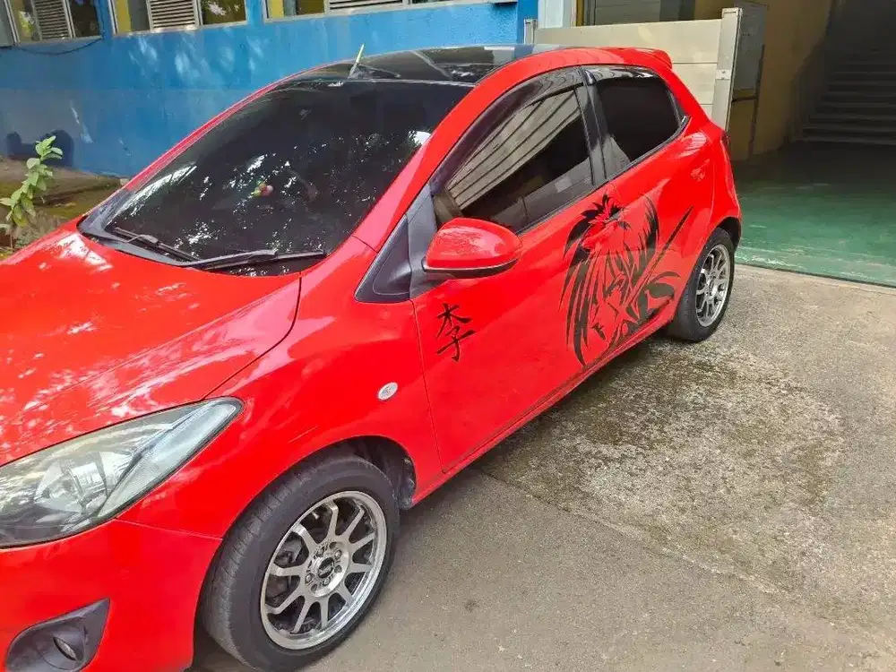 Mazda 2 1.5 AT 2013 Merah – KM 130-135rb, Banyak Part Baru, 95 Juta Ne