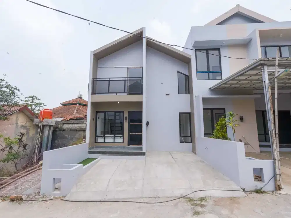 Rumah Terawat 16 Menit ke Stasiun Depok 2 Kamar Hadap Selatan J-55597