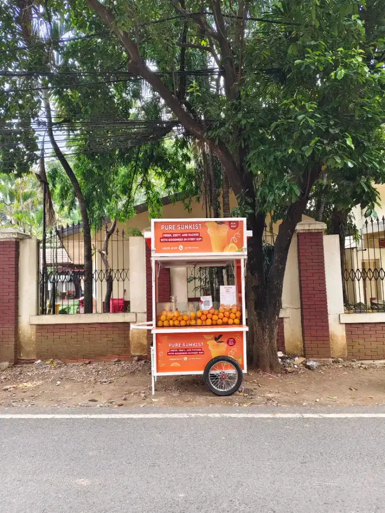 STAND MINUMAN PURE SUNKIST
