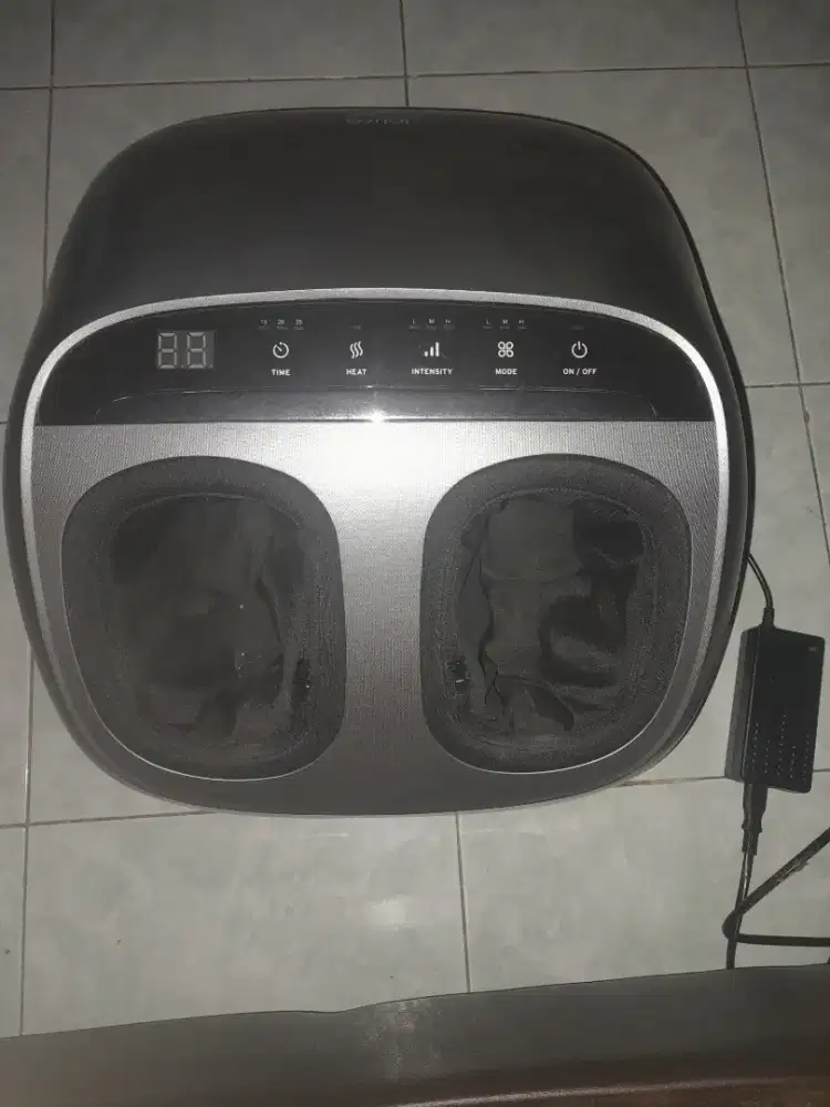 Alat pijat kaki elektronik