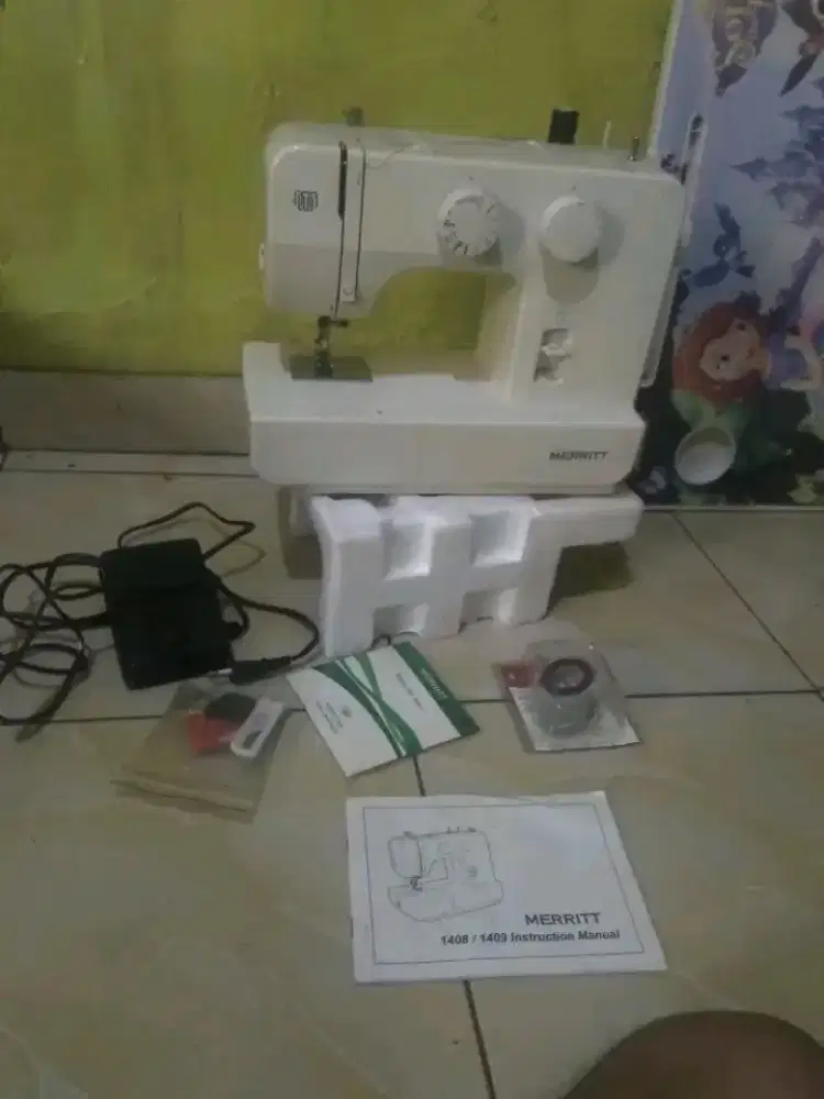 Mesin jahit portable