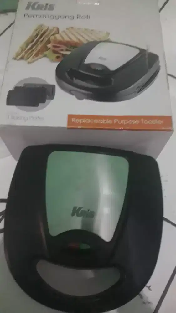 Pemanggang roti electrik merk kris