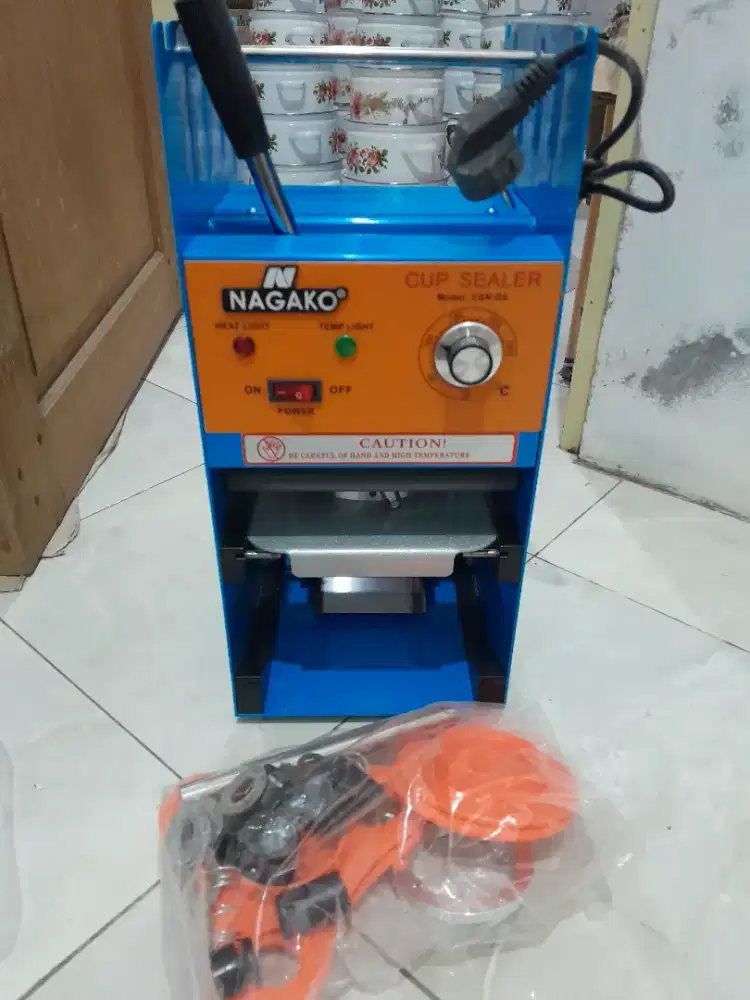 Mesin penutup gelas manual merk Nagako