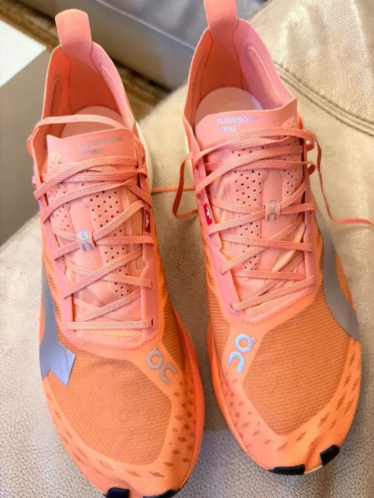on cloud boom strike sneakers running