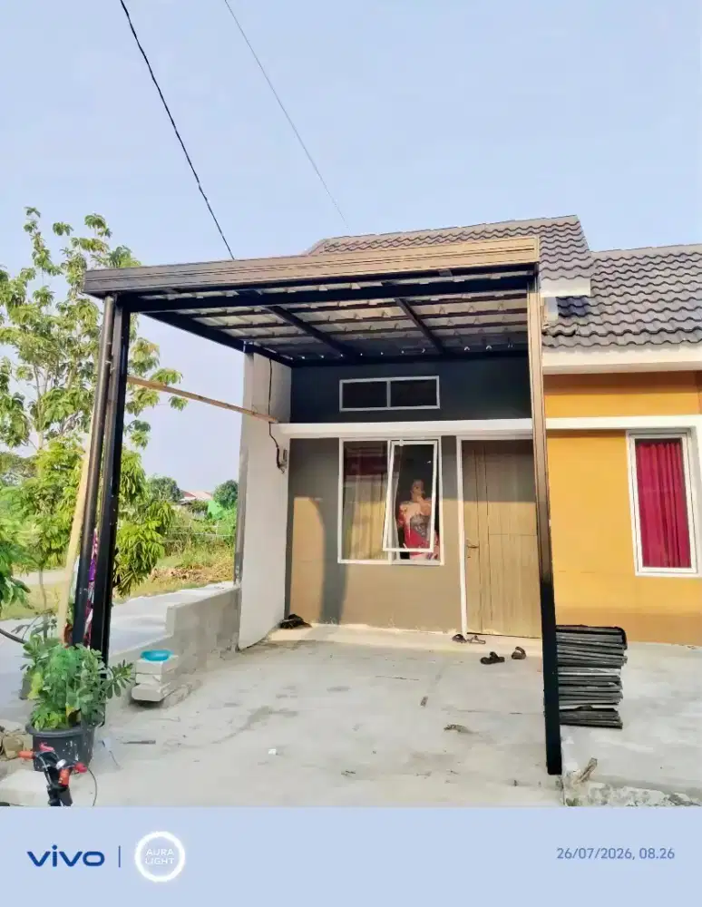 Kanopi baja ringan dan garasi
