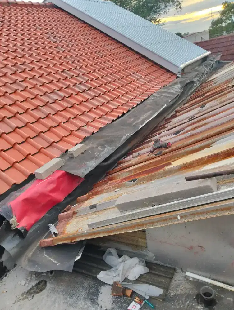 Tukang atap bocor dak rembes ganti atap