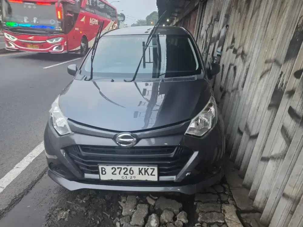 Sigra M mt 2018 tdp 5 jt