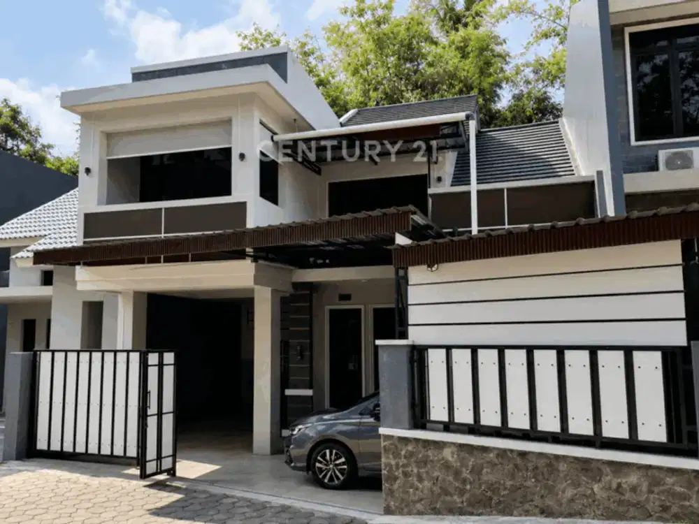 Rumah Mezzanine 2Lt Dalam Perumahan Di Mlati Dengan View Sungai