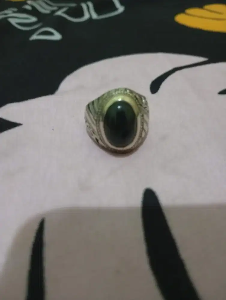 Batu bacan udah mulain berubah warnanya, cuman masih hitam