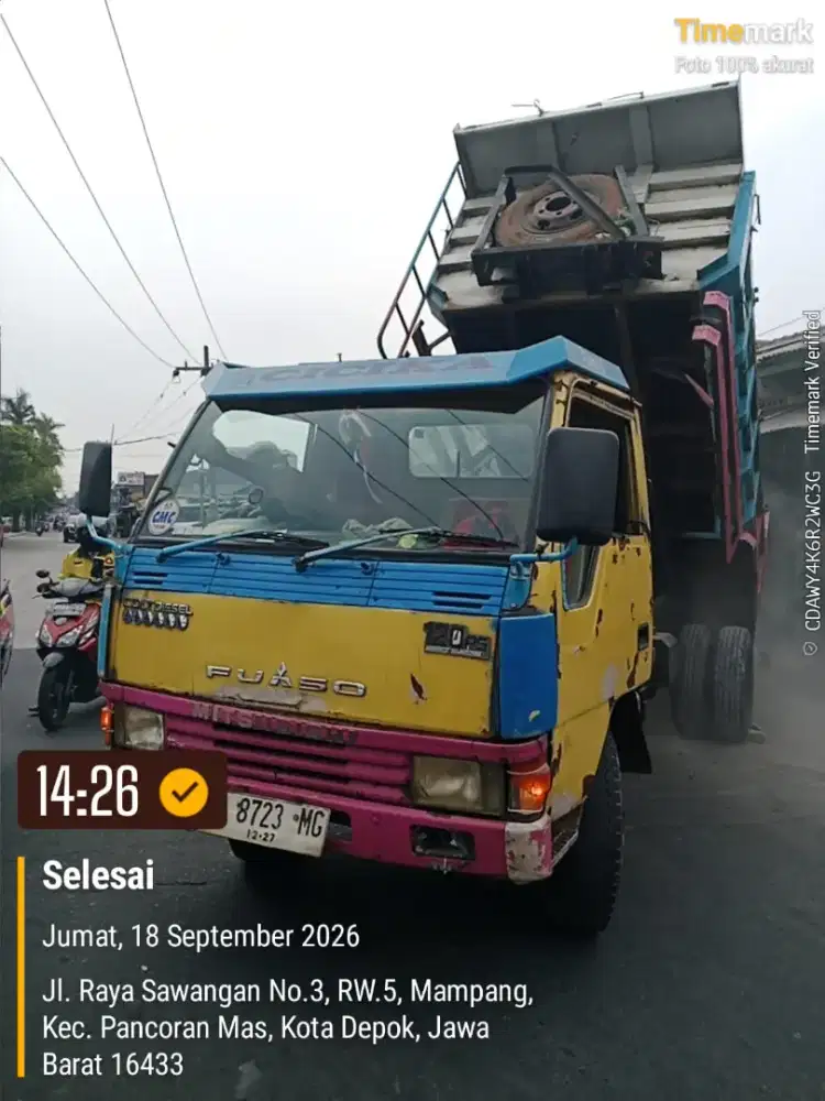 Jasa urugan dan buang puing