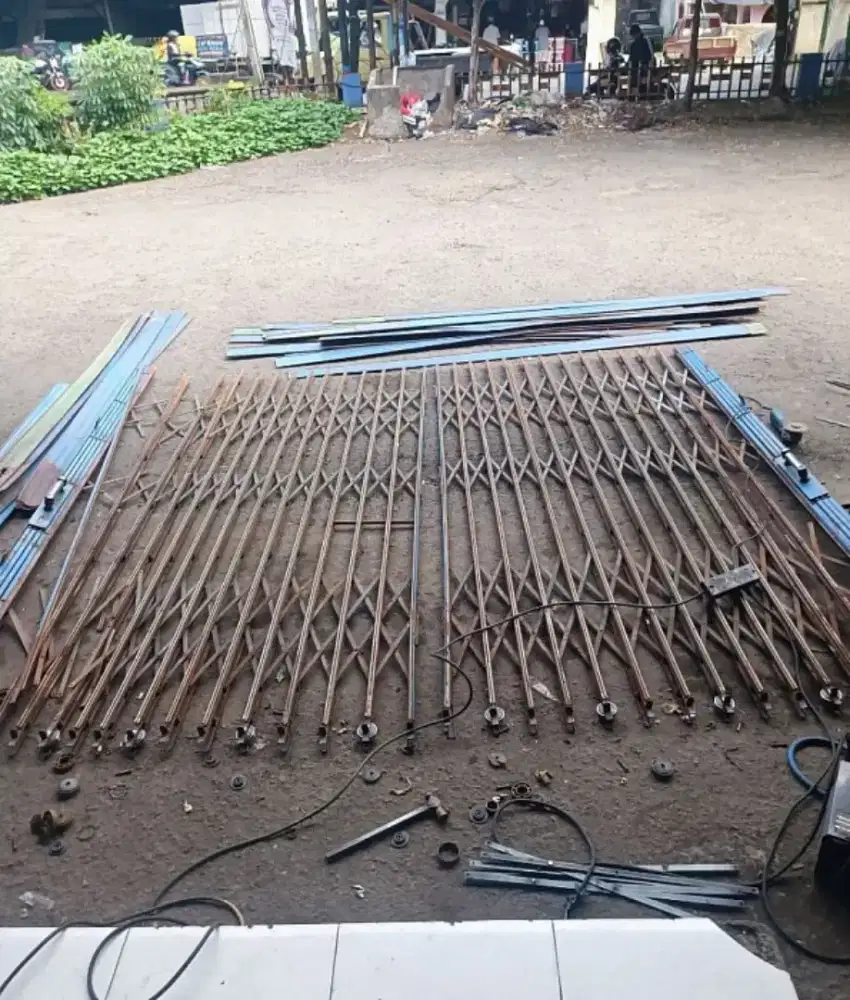 Tukang spesialis service rolling door folding gate termurah