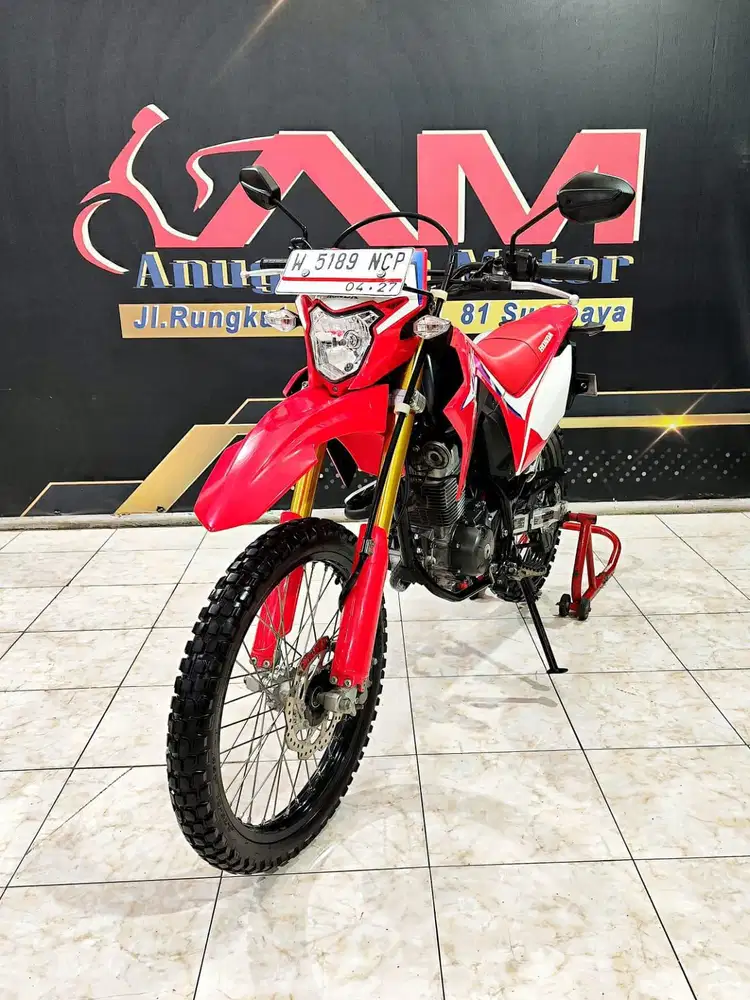 Honda CRF 150L Putih Merah Mulus Mewah Th 2021. Anugerah Motor Rungkut