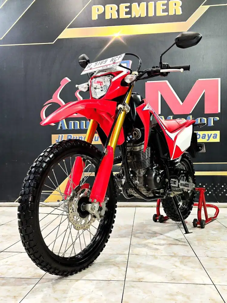 Honda CRF 150L Putih Merah Mewah Mulus Th 2022. Anugerah Motor Rungkut