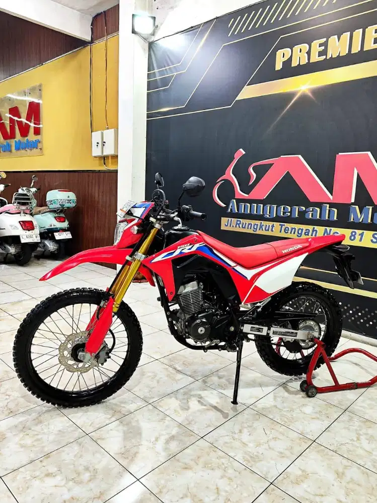 Honda CRF 150L Putih Merah Mewah Mulus Th 2022. Anugerah Motor Rungkut