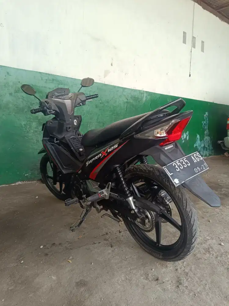 Honda Supra X 125 Fi 2017 hitam doff KM low