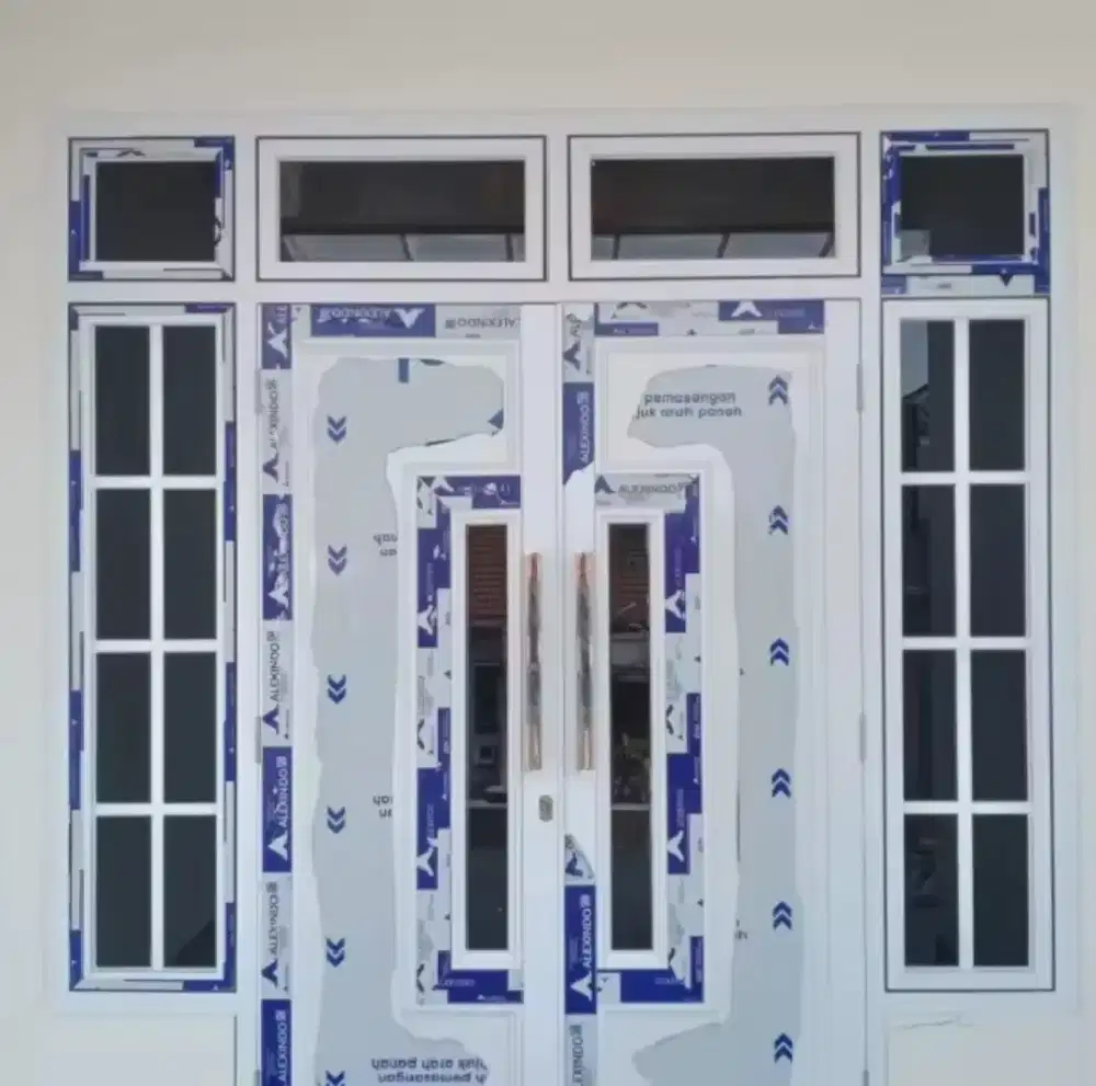 Pemasangan kusen aluminium pintu jendela dll