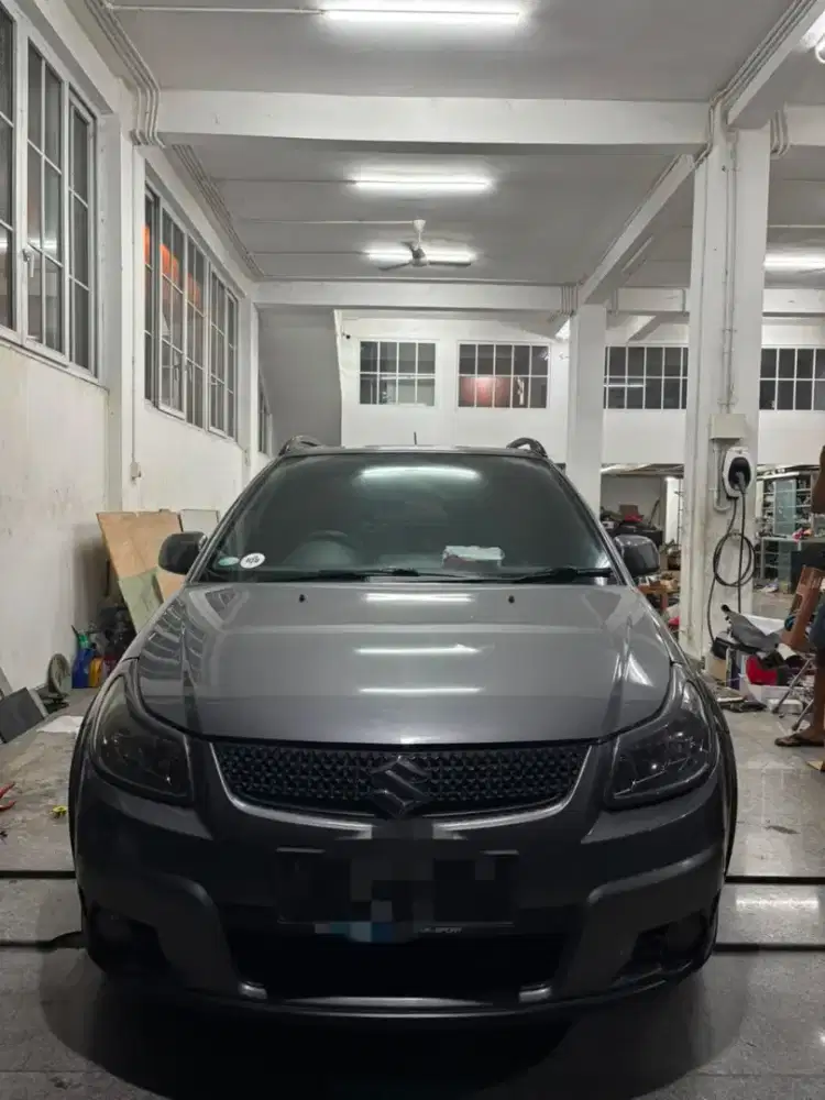 Suzuki X over automatik thn 2011