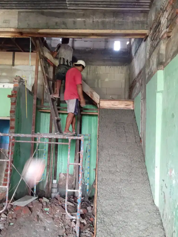 Mengerjakan rumah D renofasi rumah