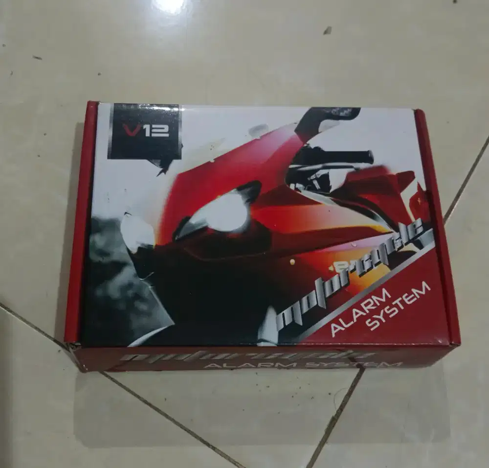 Alarm system remot untuk motor