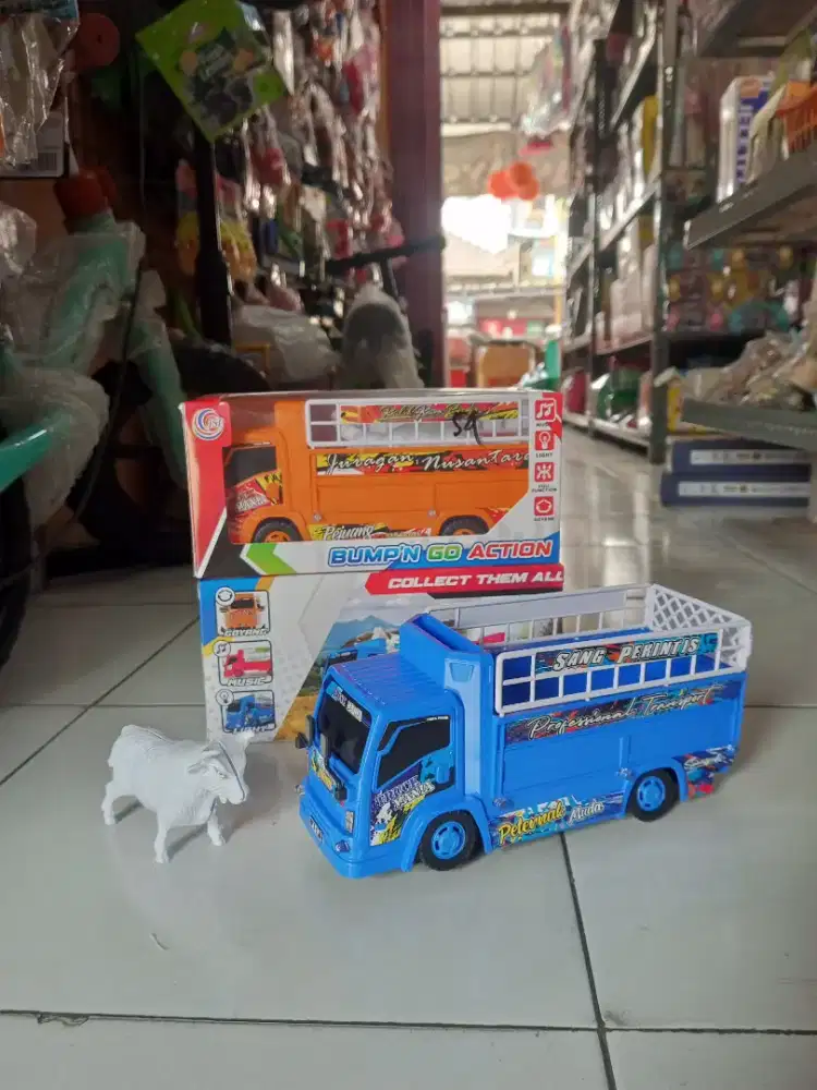 Mainan anak truk oleng sapi baterai