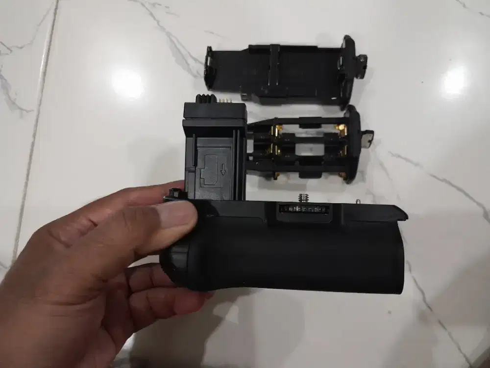 Batre grip kamera Canon 450D 500D 1000D