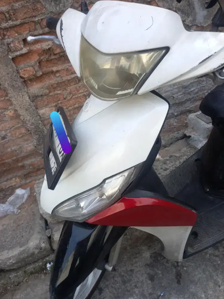 Yamaha Mio J warna merah putih