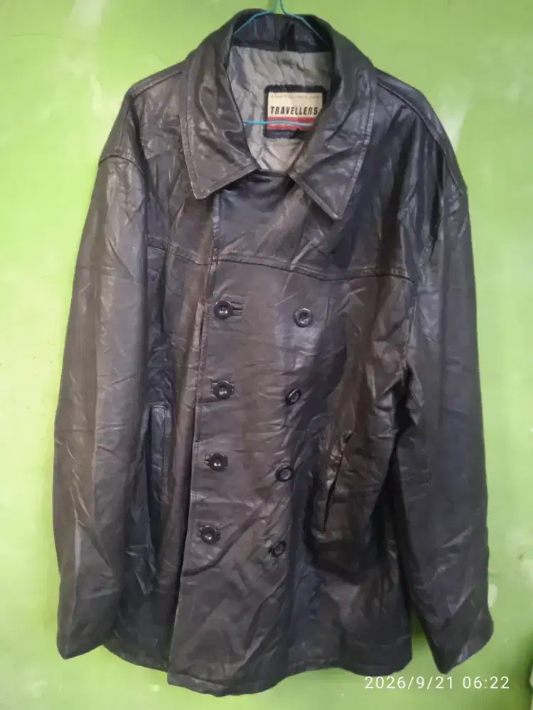 Jaket Kulit asli import, model long, hitam mulus.
