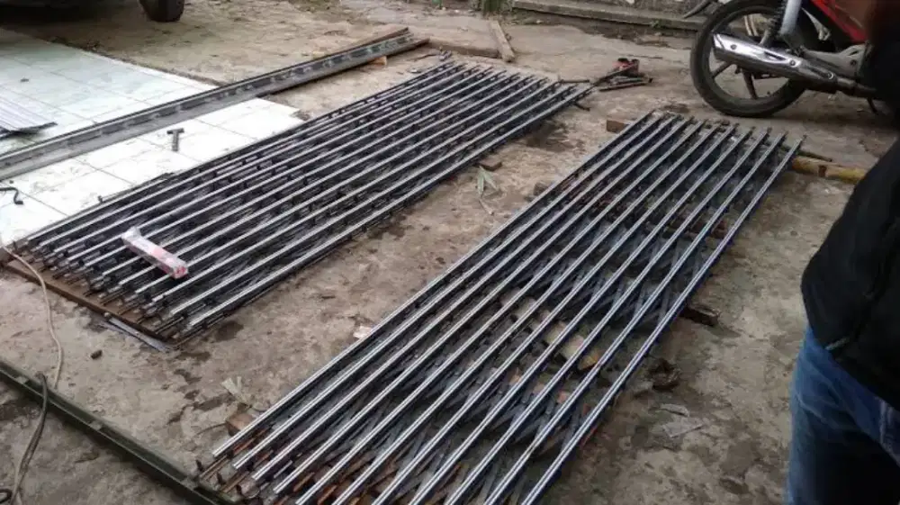 Tukang reparasi service rolling door folding gate murah