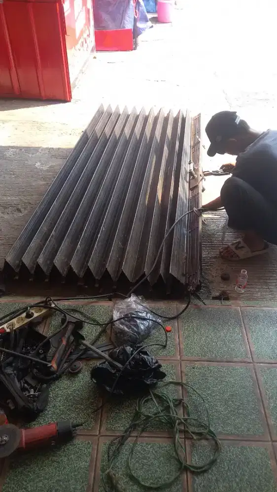 Tukang pasang dan service rolling door folding gate murah