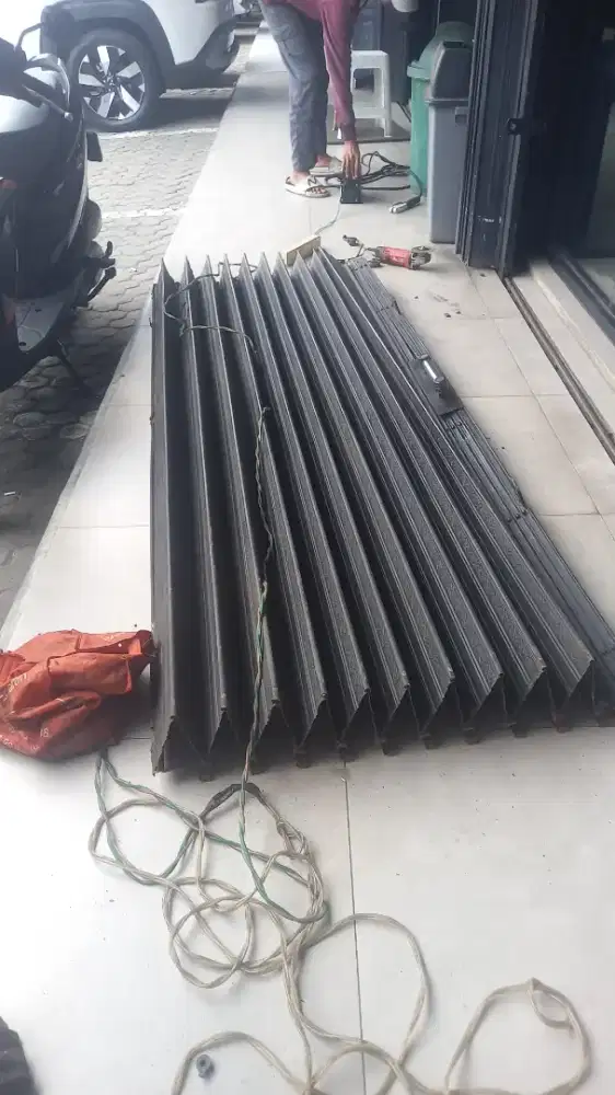 Tukang spesialis service rolling door folding gate murah