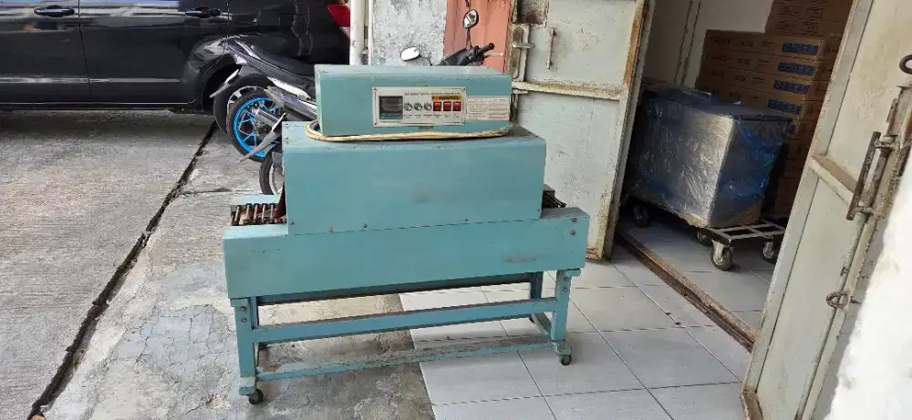mesin thermal shrinking packing vakum plastik