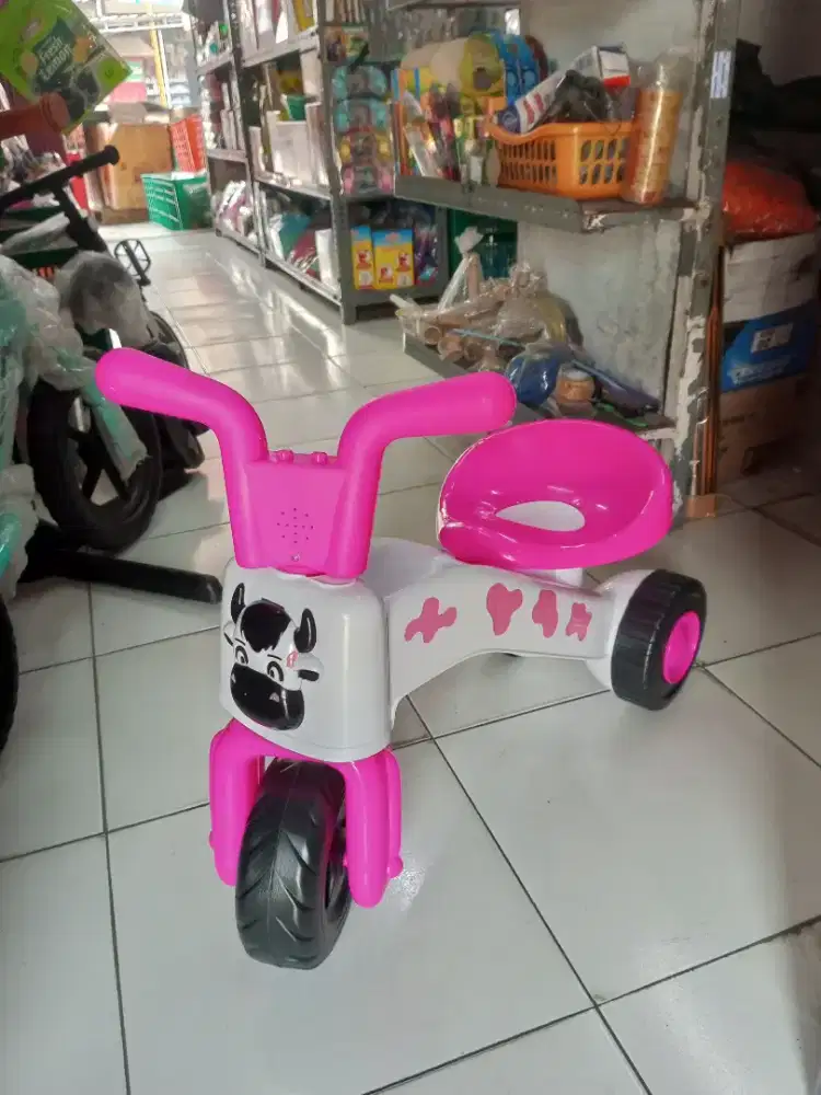 Mainan anak sepeda sapi musik naik