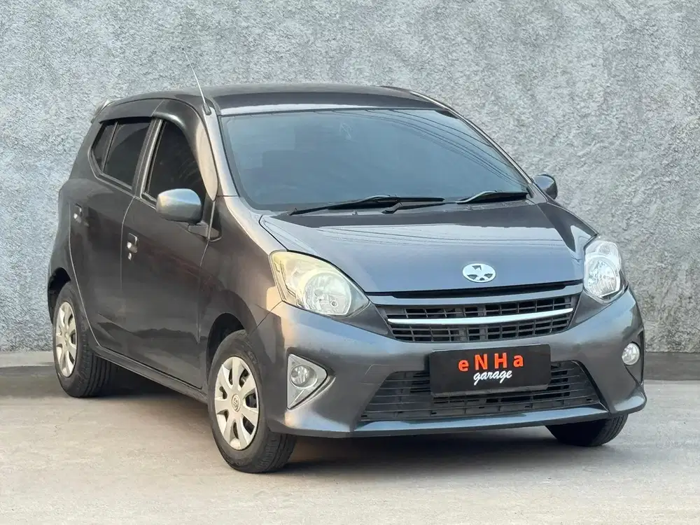 Dp 5 JT.. Toyota Agya E 1.0 Manual 2015.. eNHa garage Semarang..