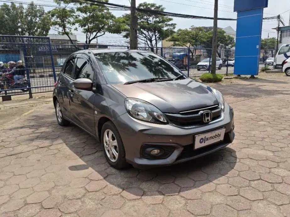 DP MURAH Honda Brio Satya 1.2 E Bensin-AT 2016 Abu-Abu CVKPB