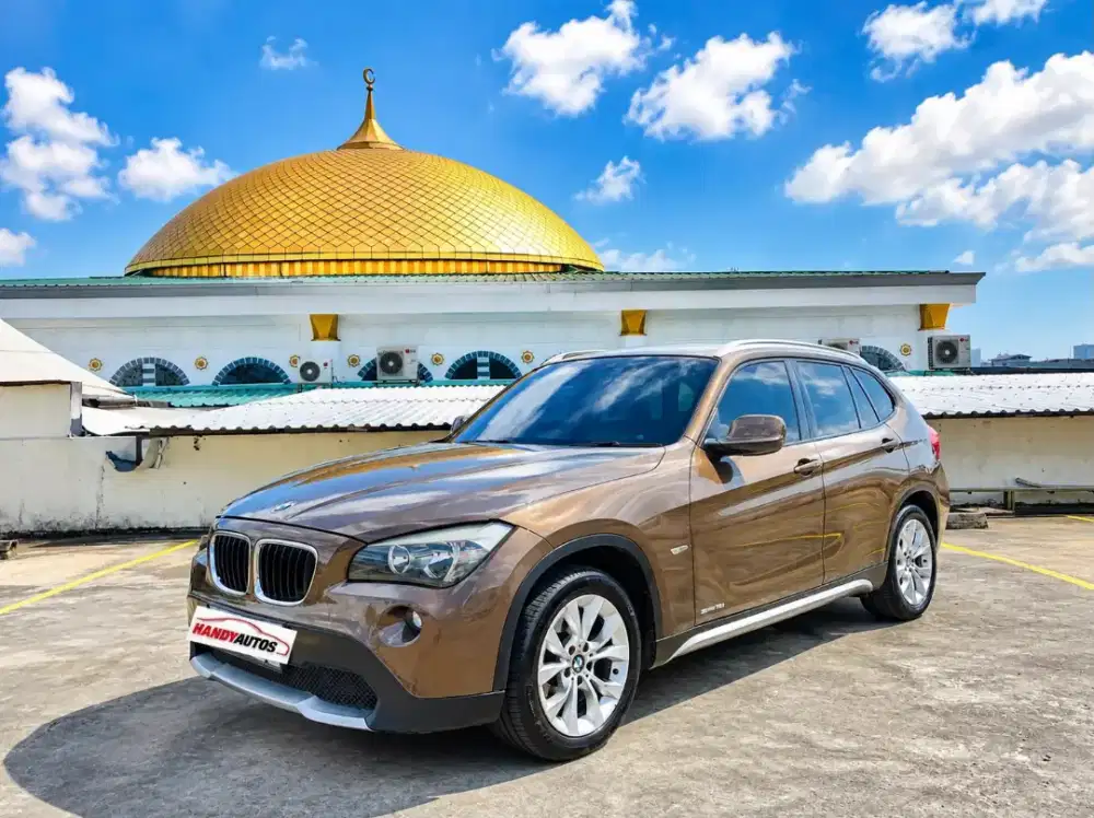 BMW X1 Executive 2011 Automatic Coklat Metalik