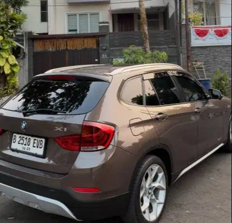 BMW X1 type Xline tahun 2013 Automatic RARE Color Sparkling Bronze