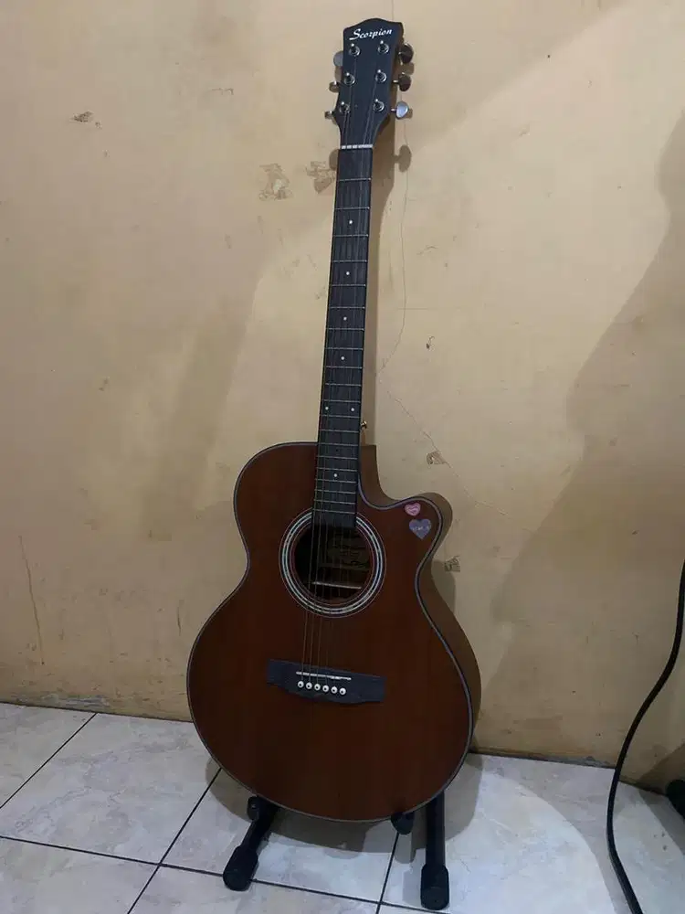 Gitar akustik merk scorpion