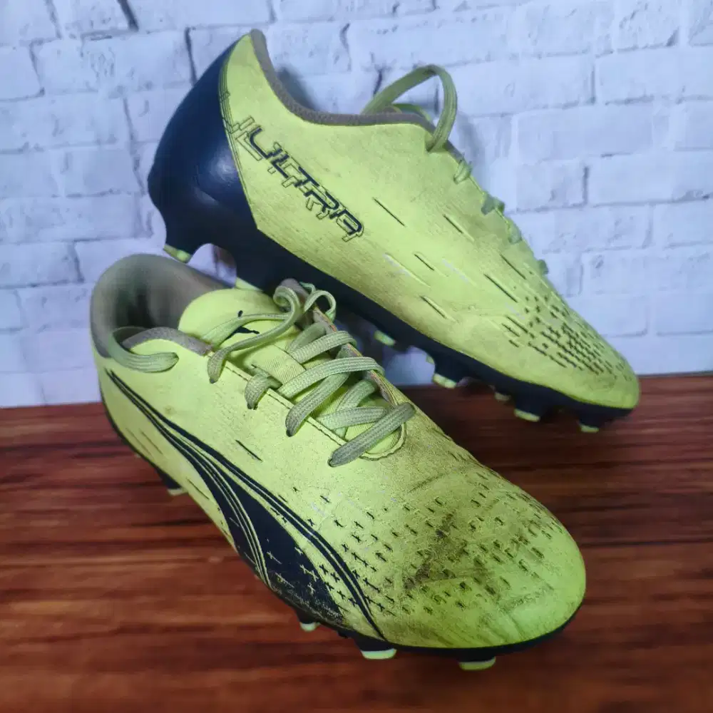 Sepatu Bola Puma Ultra Play FG/AG Junior (106923 01)
