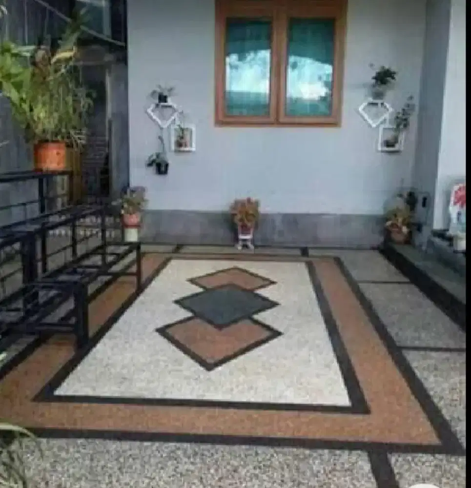 Tukang batu sikat motif