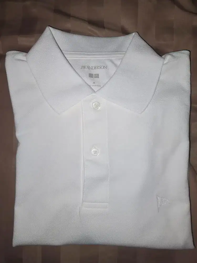 KAOS POLO UNIQLO X JW ANDERSON