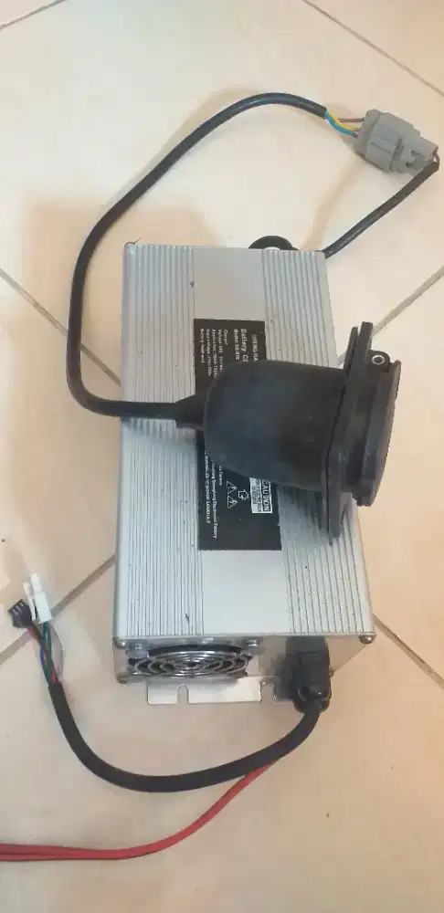 Battery charger & dinamo motor listrik
