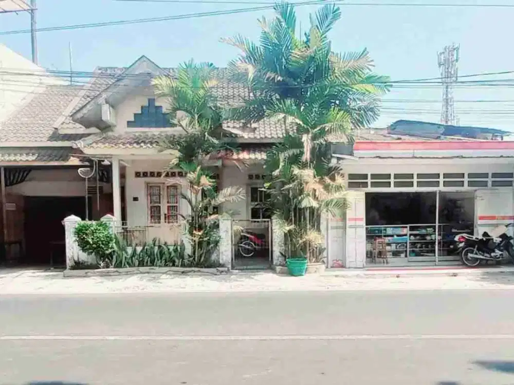 rumah dan tempat usaha tepi jalan raya Manahan