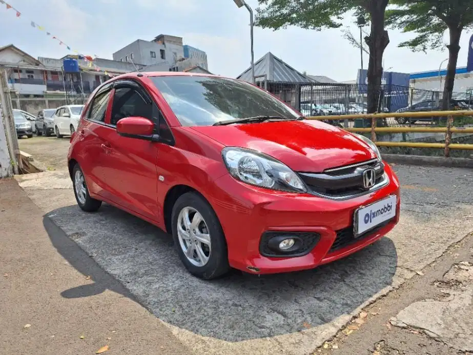DP MURAH Honda Brio Satya 1.2 E Bensin-AT 2017 Merah CUAKD
