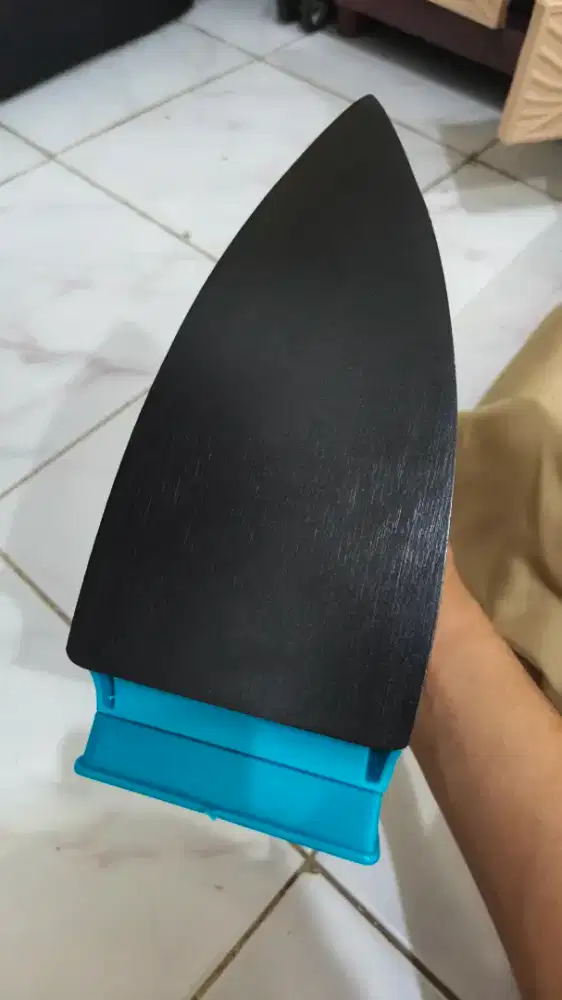 Setrika yakasa pemakaian kedua