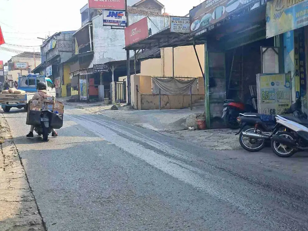 Dijual cepat Rumah dua lantai + tempat usaha