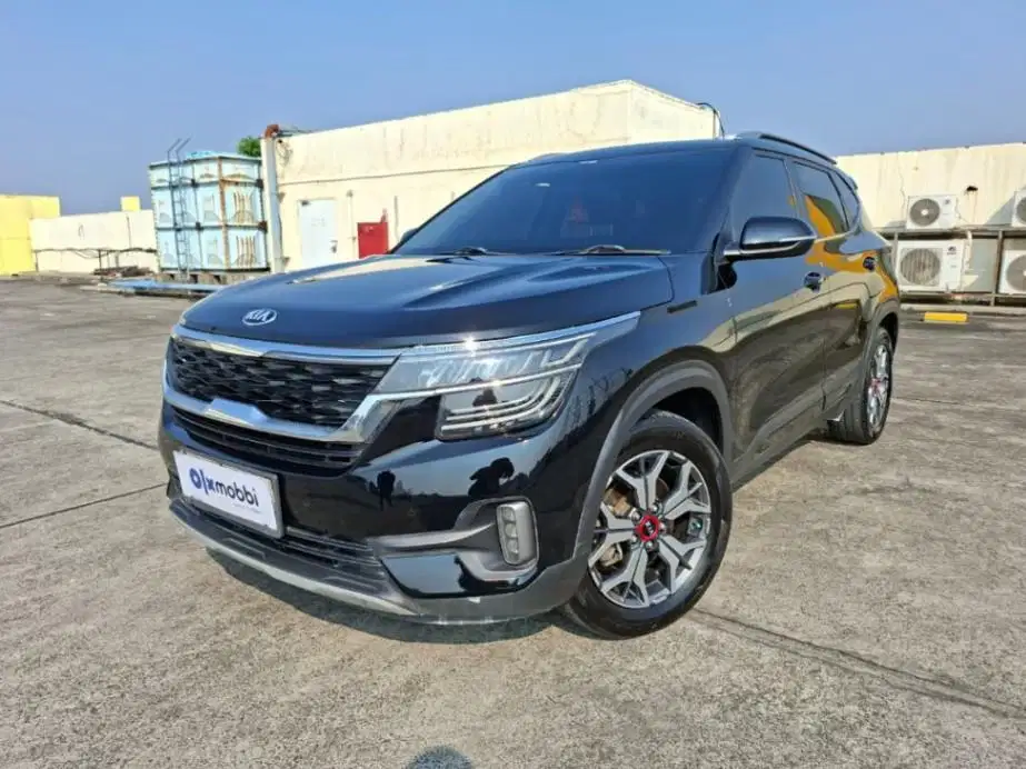 DP 11 JT Kia Seltos 1.4 EX Plus Bensin-AT Hitam 2022
