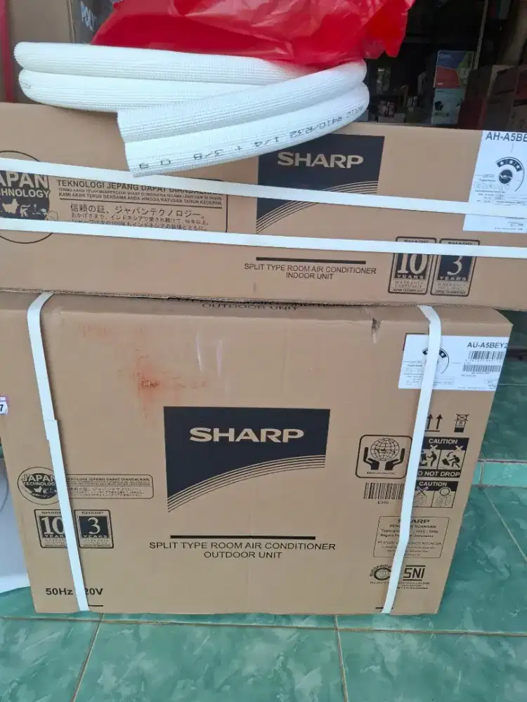 Ac ½ PK merk sharp baru