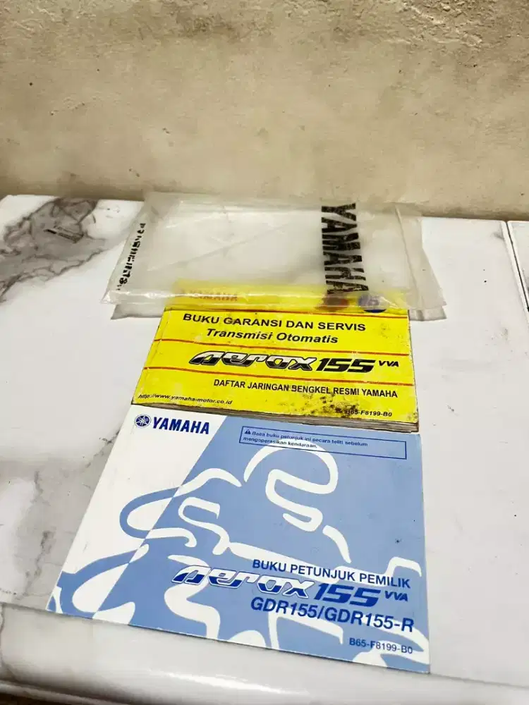 Buku petunjuk pemilik dan buku garansi aerox 155