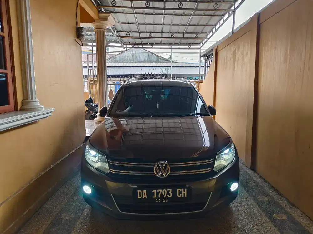 Volkswagen Tiguan 1.4 tdi at 2013