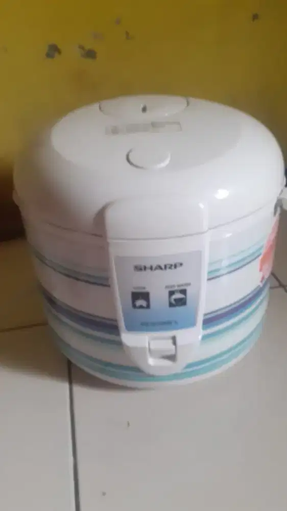 Dijual magic com merek Sharp kondisi msh bagus jarang di pakai